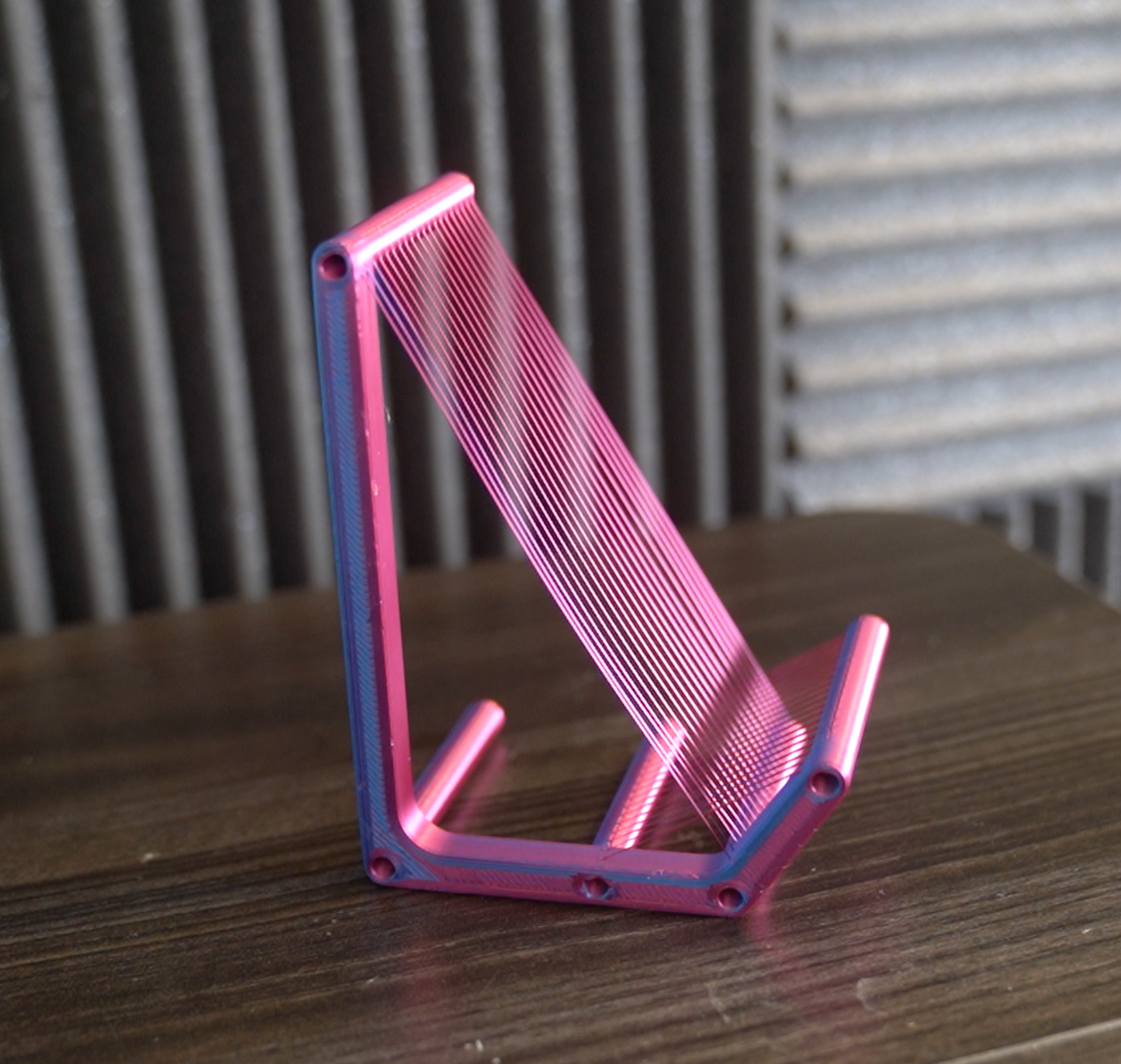 Experimental Tension Strand Phone Stand