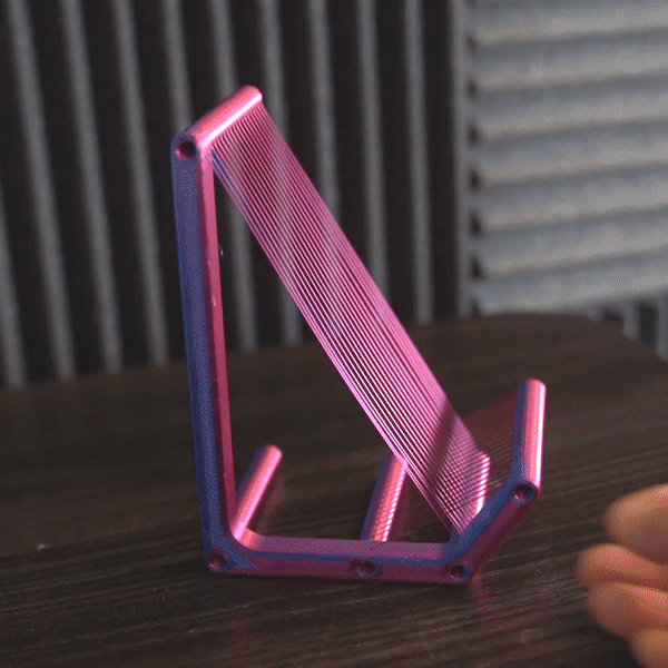 Experimental Tension Strand Phone Stand